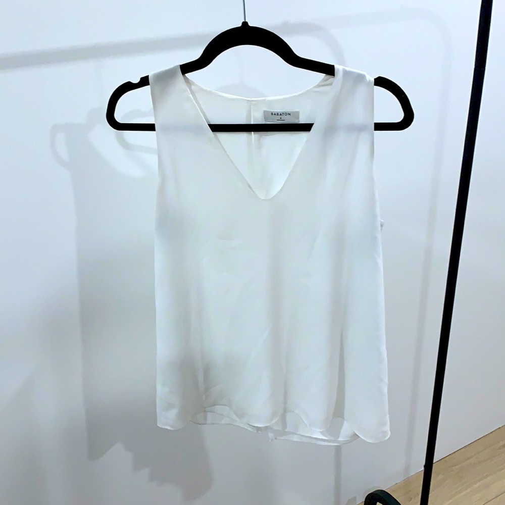 Babaton off white sleeveless blouse